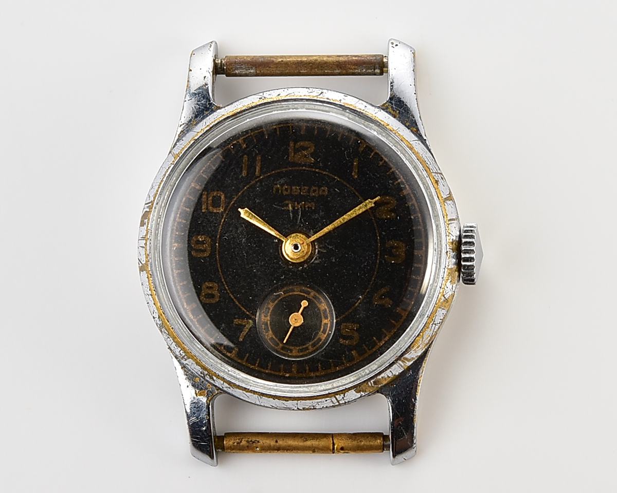 Vintage soviet mechanical watch POBEDA ZIM from the 1950s