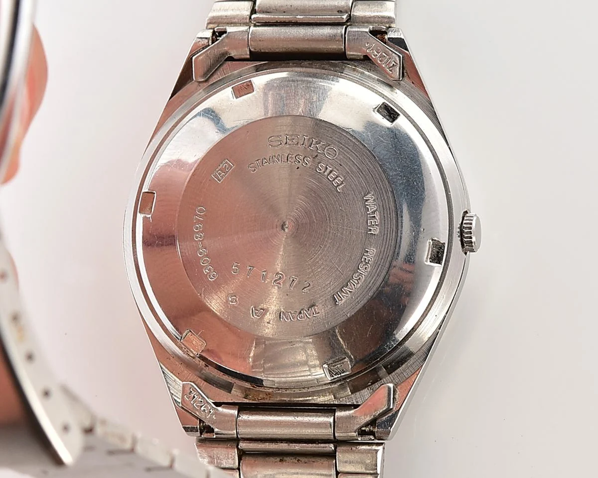 Vintage 1985 Seiko 5 Automatic with Military-Style Black Dial with English/Arabic Day-Date