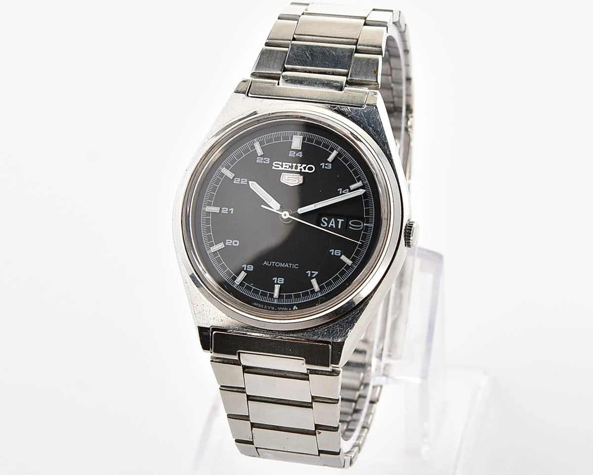 Vintage 1985 Seiko 5 Automatic with Military-Style Black Dial with English/Arabic Day-Date