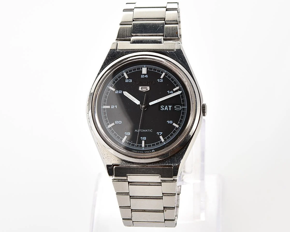 Vintage 1985 Seiko 5 Automatic with Military-Style Black Dial with English/Arabic Day-Date