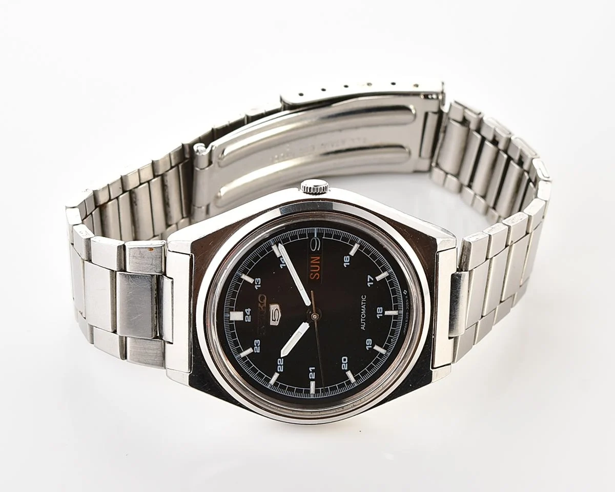 Vintage 1985 Seiko 5 Automatic with Military-Style Black Dial with English/Arabic Day-Date