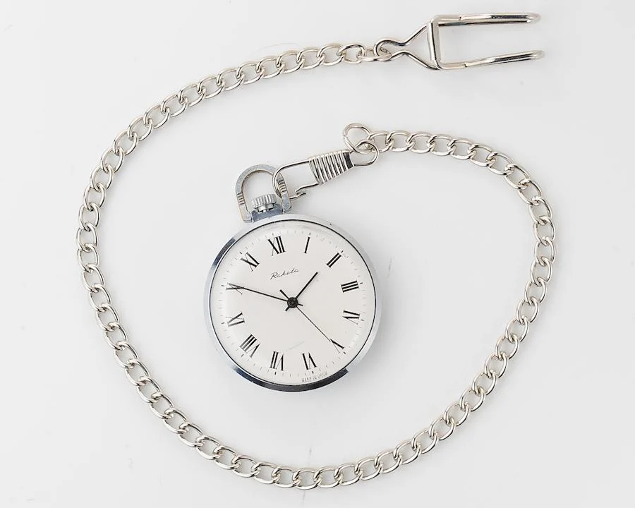 Mechanical Raketa Soviet pocket (or pendant) watch with roman numerals
