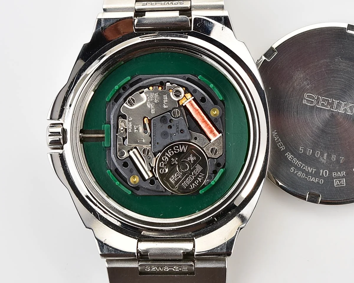 Vintage Seiko Multi-Calendar Quartz Watch with Deep Teal Globe Dial