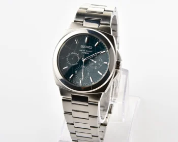 Vintage Seiko Multi-Calendar Quartz Watch with Deep Teal Globe Dial