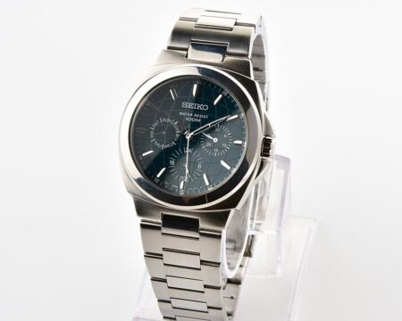 Vintage Seiko Multi-Calendar Quartz Watch with Deep Teal Globe Dial
