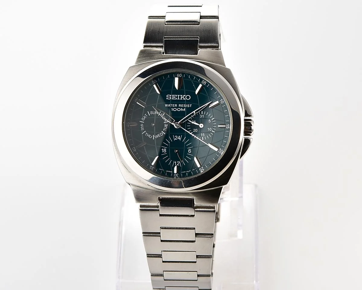 Vintage Seiko Multi-Calendar Quartz Watch with Deep Teal Globe Dial