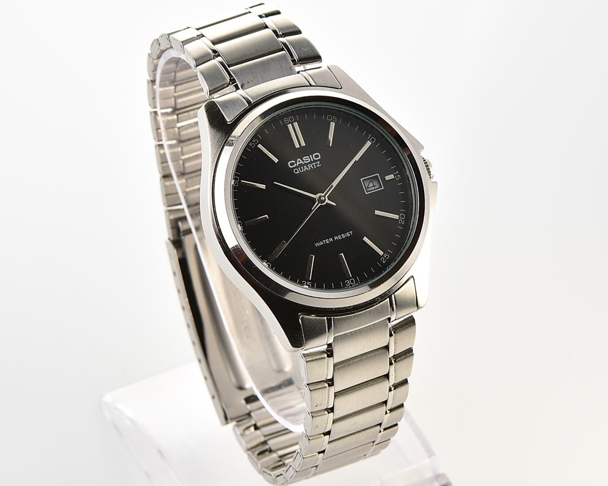 Casio MTP-1183 – Black Sunburst Date Quartz