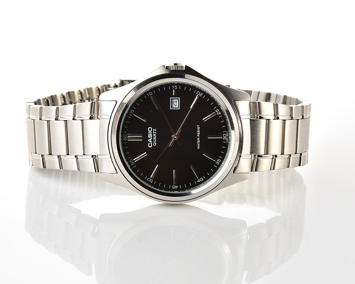 Casio MTP-1183 – Black Sunburst Date Quartz