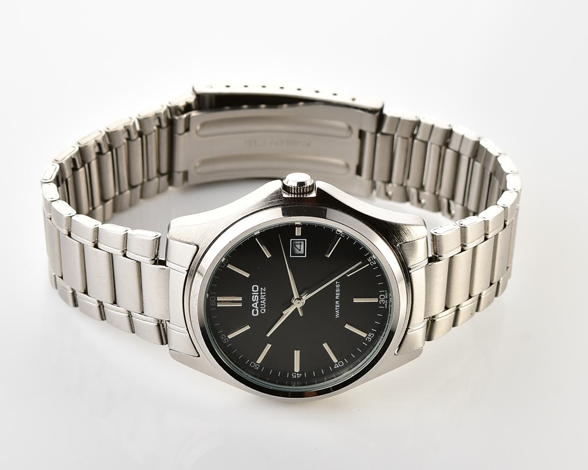Casio MTP-1183 – Black Sunburst Date Quartz