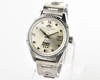 Vintage Orient Weekly Auto AAA Swimmer – Silver Sunburst Day-Date Automatic from 1960s