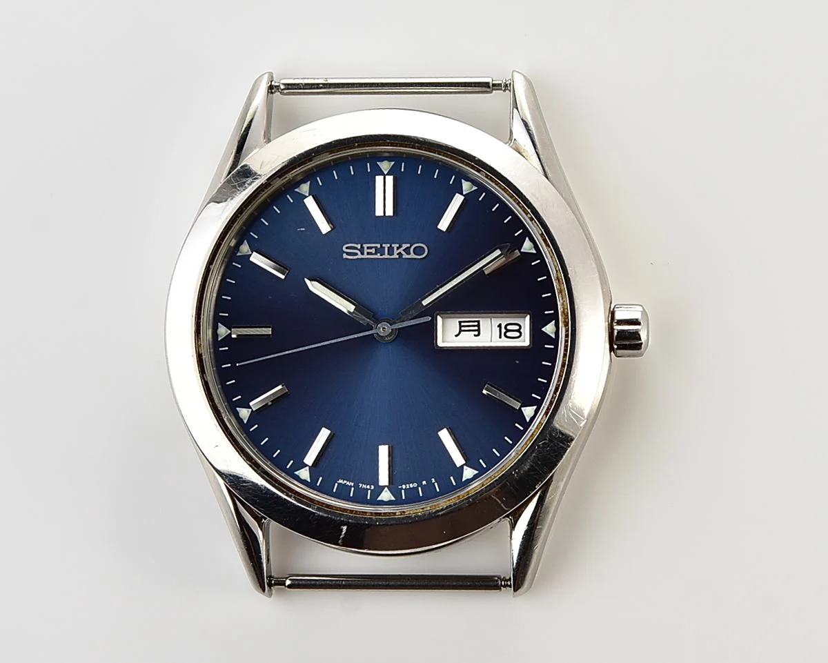 Seiko Spirit stainless steel quartz day-date watch with NATO strap