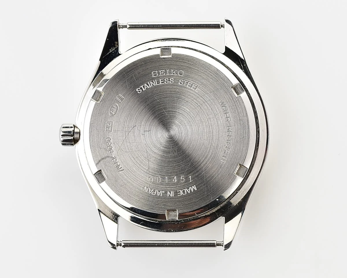 Seiko Spirit stainless steel quartz day-date watch with NATO strap