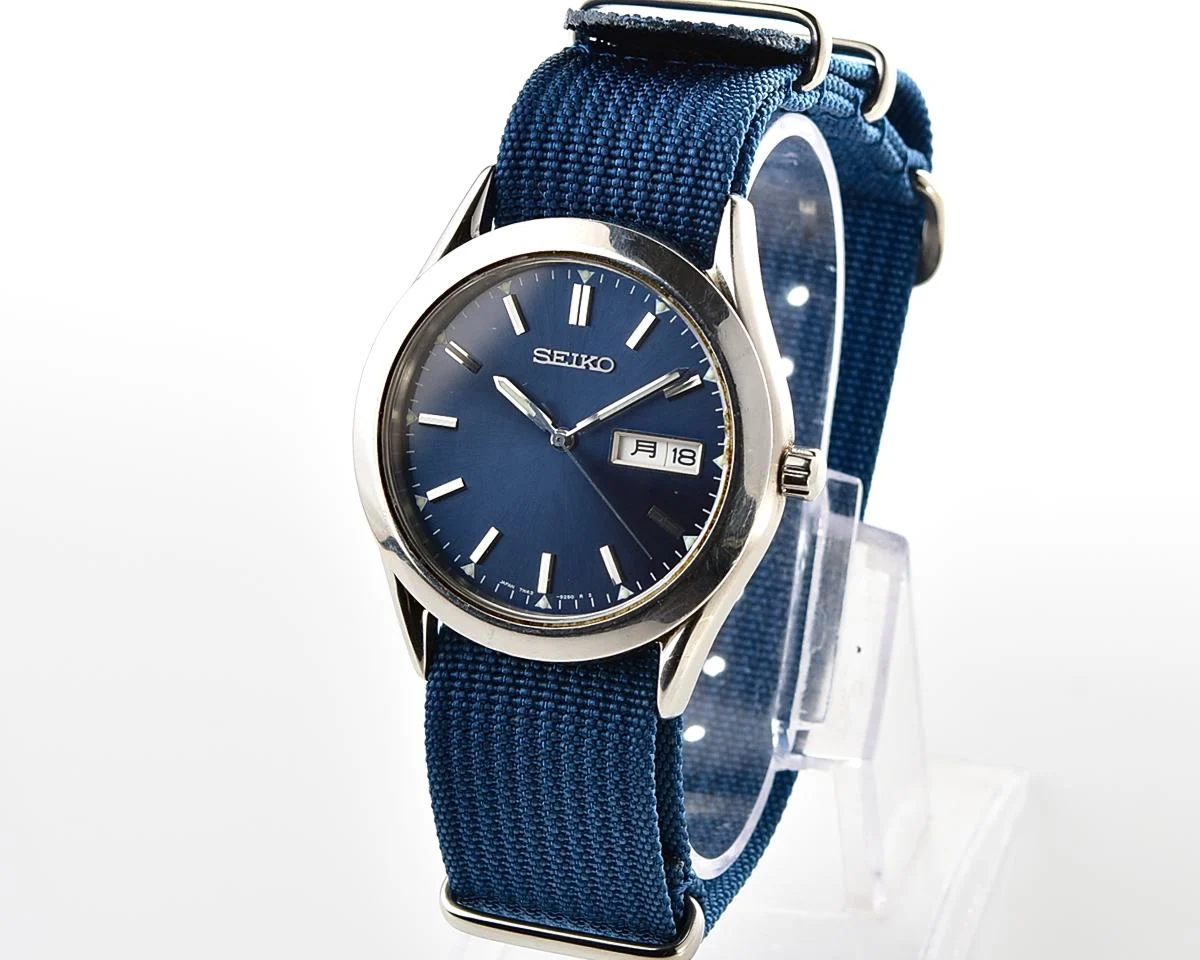 Seiko Spirit stainless steel quartz day-date watch with NATO strap