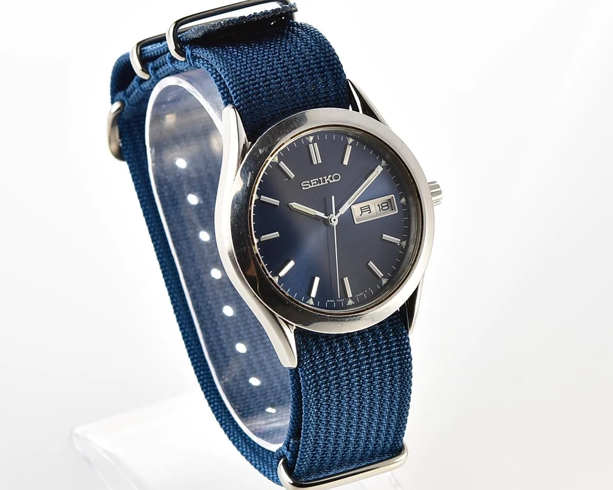 Seiko Spirit stainless steel quartz day-date watch with NATO strap