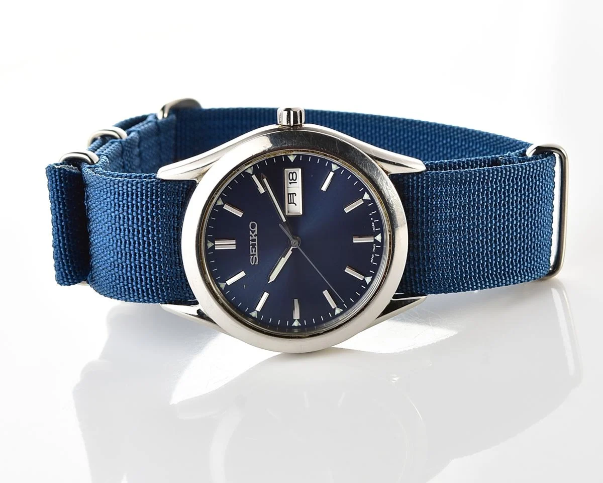 Seiko Spirit stainless steel quartz day-date watch with NATO strap