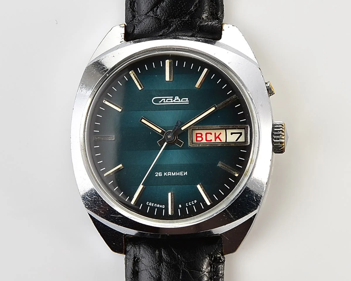 Excellent Soviet Slava vintage mechanical wristwatch with rare teal dial
