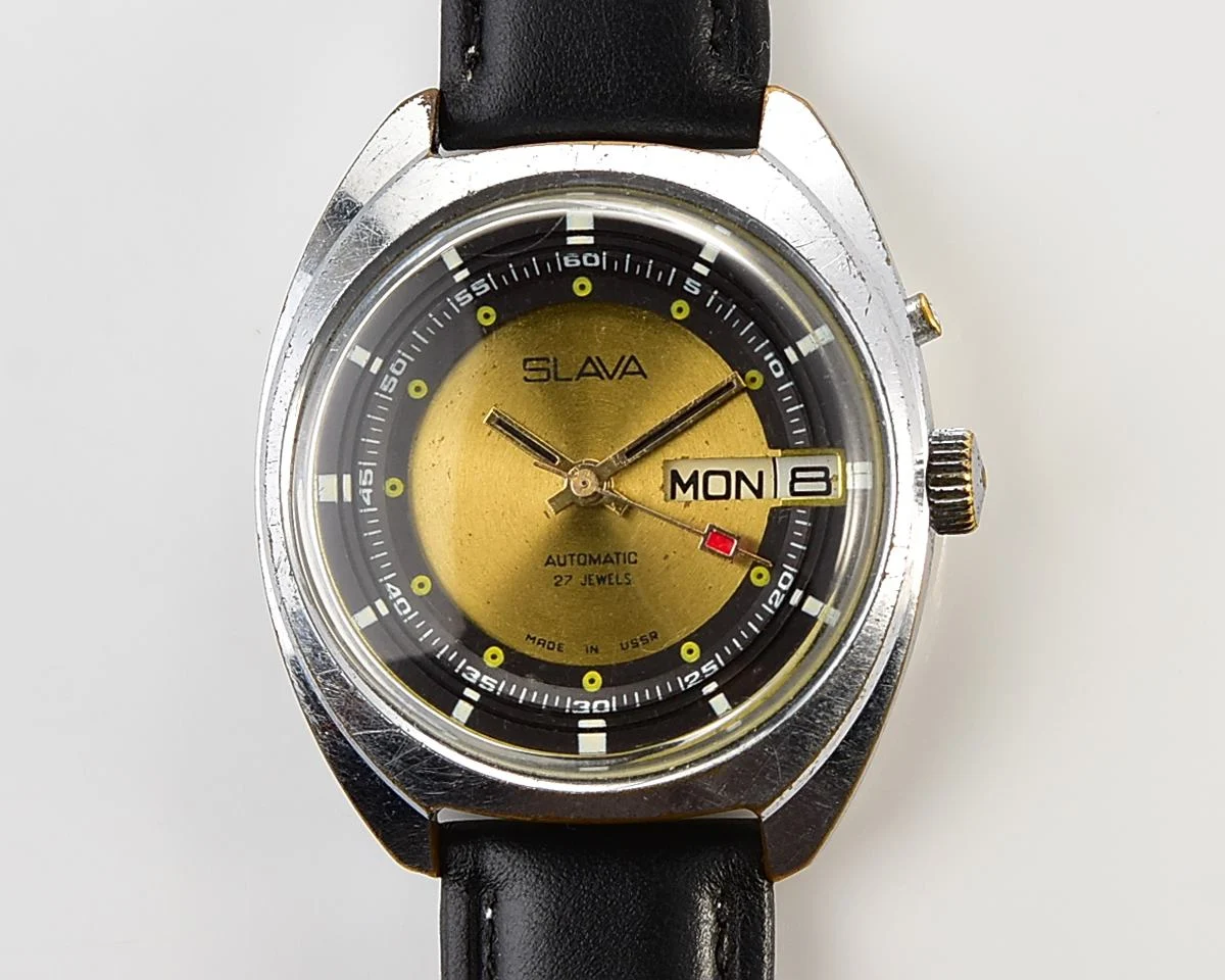 Slava Soviet mechanical vintage watch with automatic self-winding movement