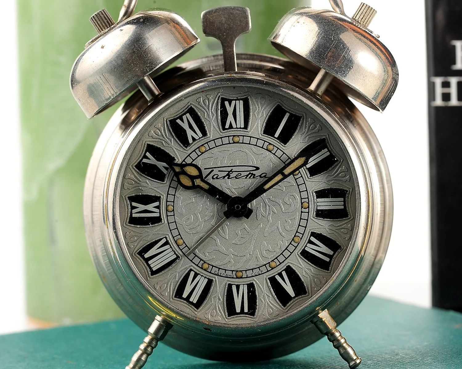 Small Raketa Soviet mechanical alarm clock