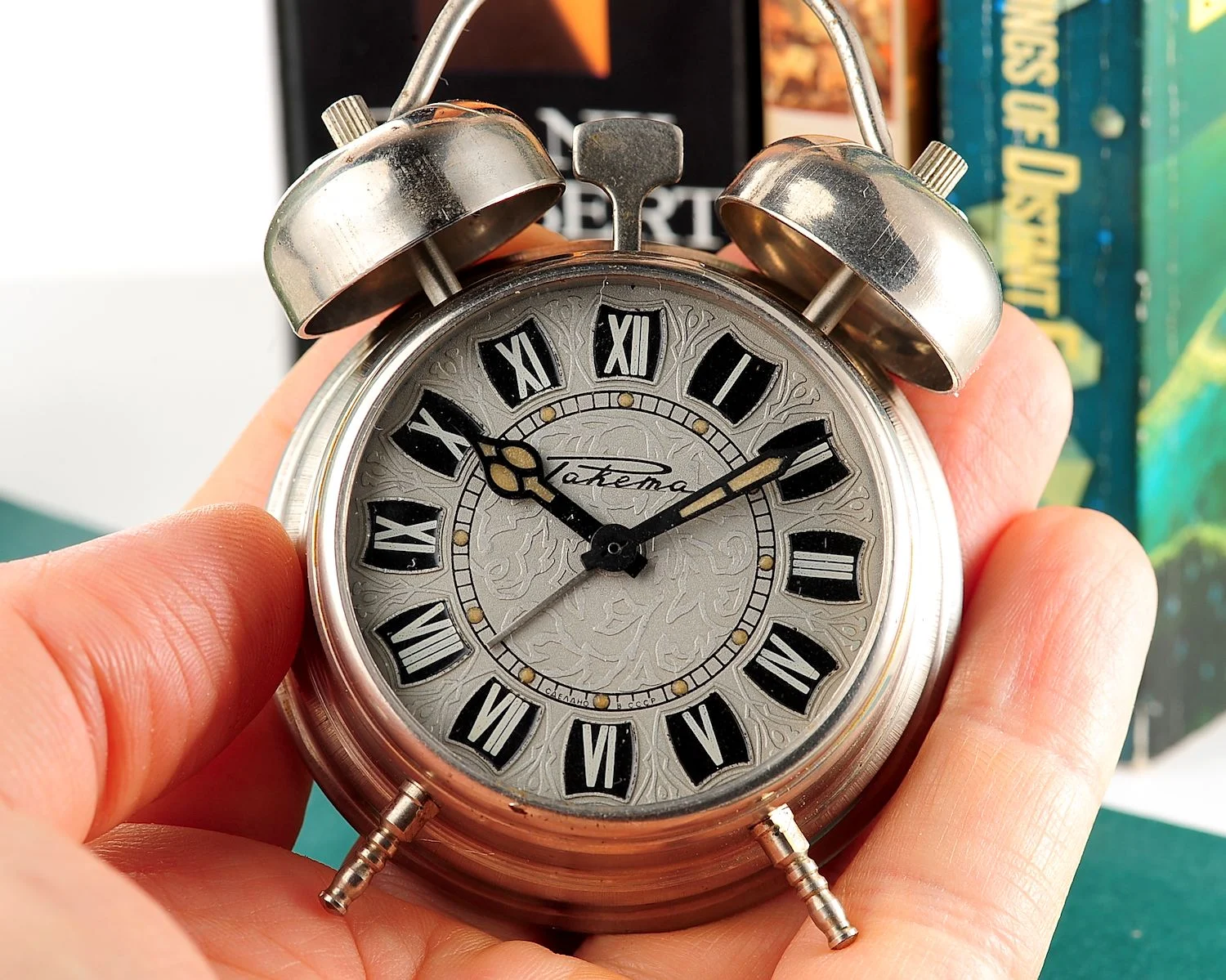 Small Raketa Soviet mechanical alarm clock