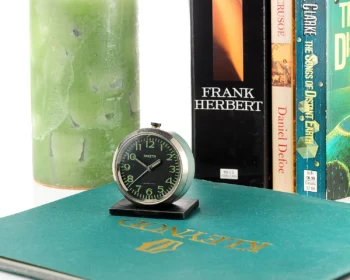 Small Raketa Soviet mechanical alarm clock - less than 2 inches in diameter