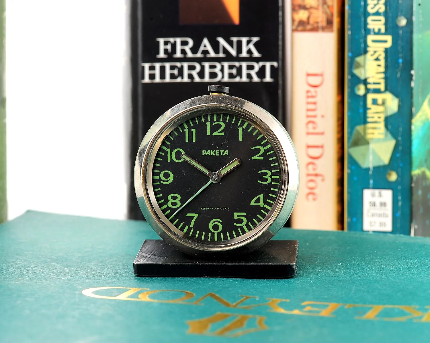 Small Raketa Soviet mechanical alarm clock - less than 2 inches in diameter