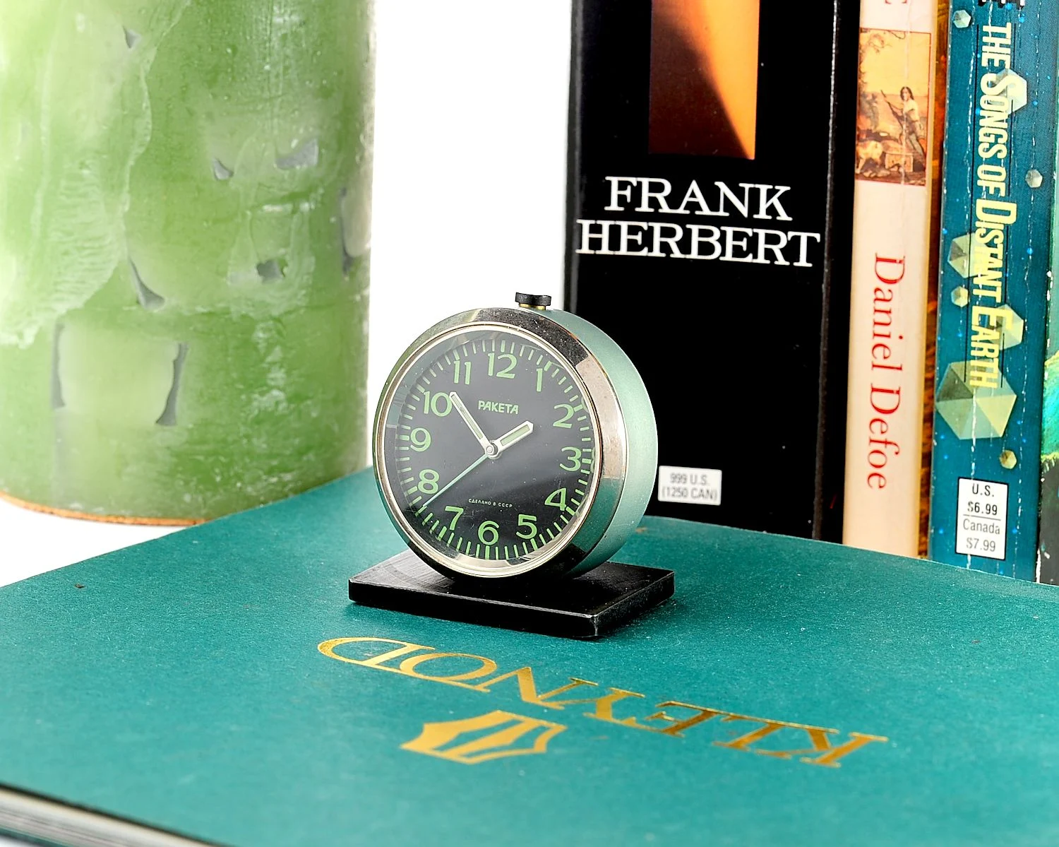 Small Raketa Soviet mechanical alarm clock - less than 2 inches in diameter