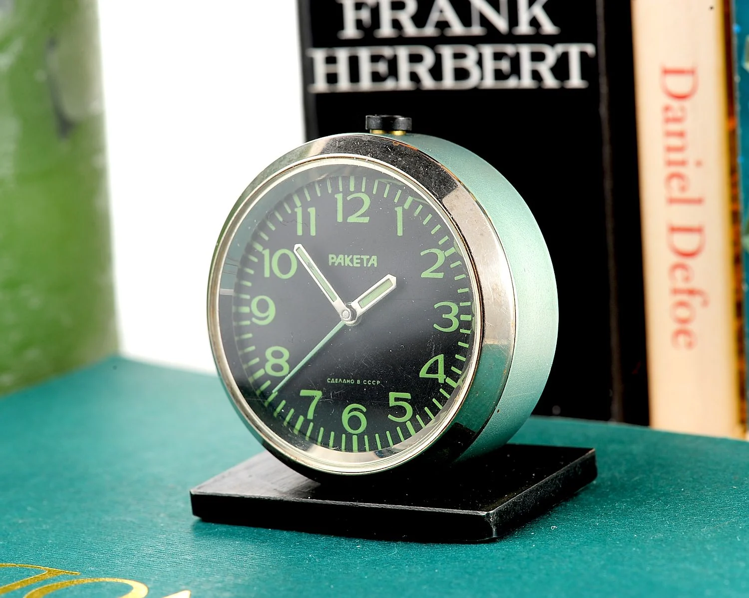 Small Raketa Soviet mechanical alarm clock - less than 2 inches in diameter