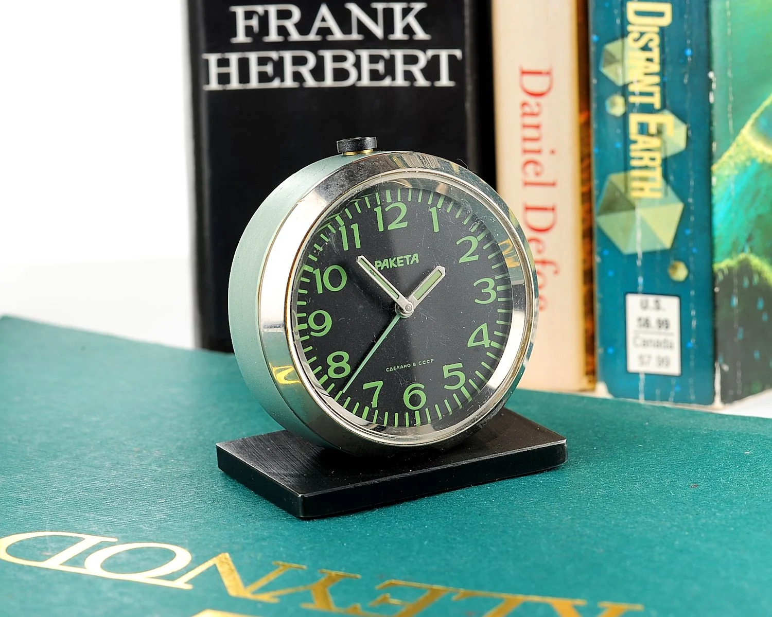 Small Raketa Soviet mechanical alarm clock - less than 2 inches in diameter