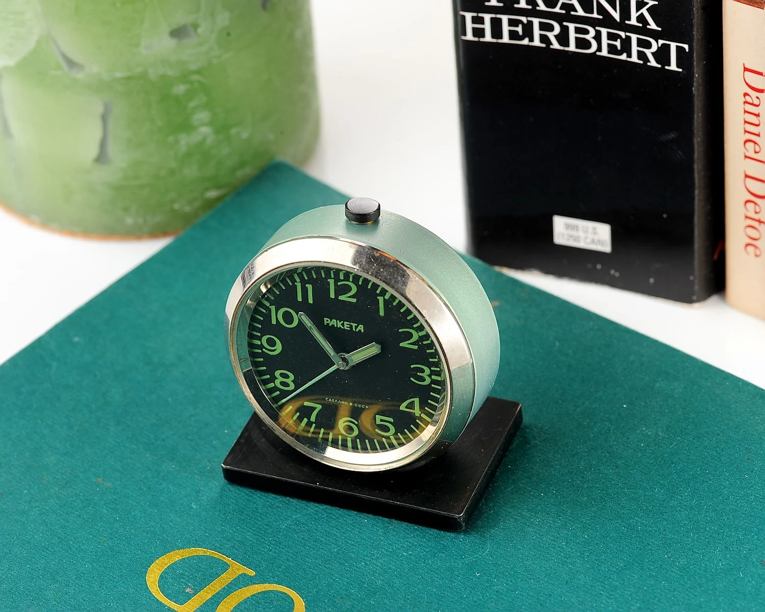 Small Raketa Soviet mechanical alarm clock - less than 2 inches in diameter