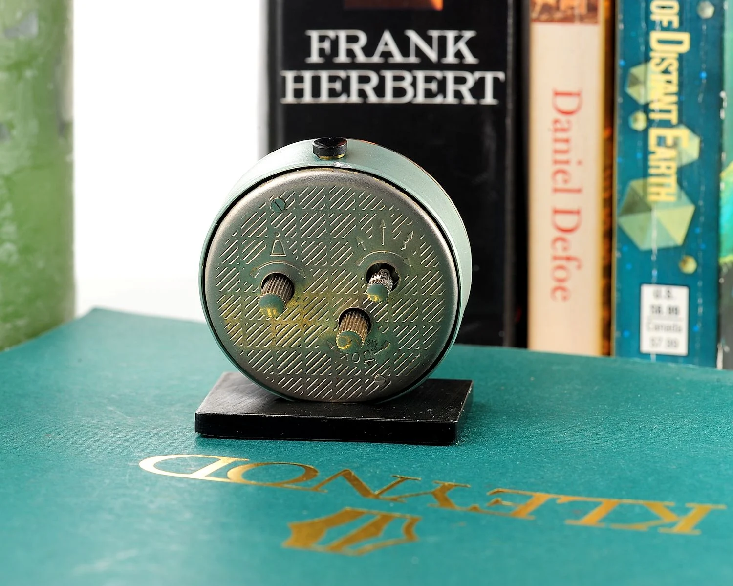 Small Raketa Soviet mechanical alarm clock - less than 2 inches in diameter