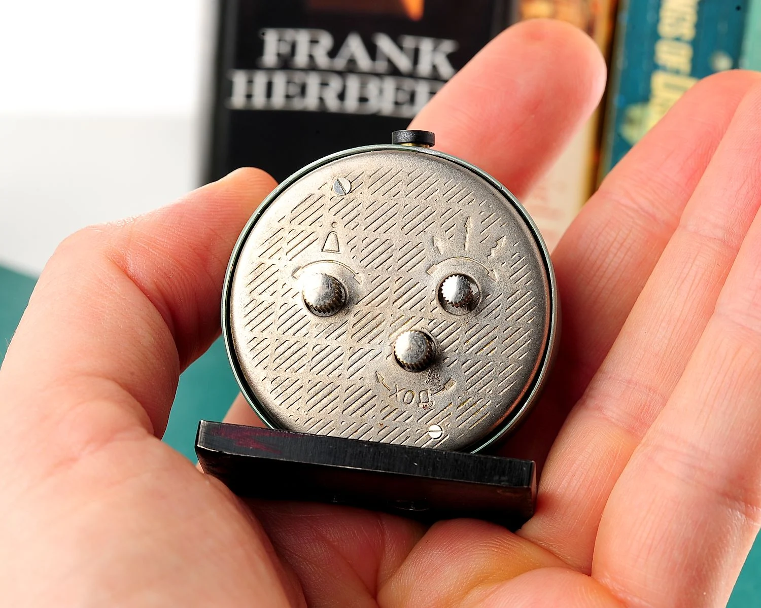 Small Raketa Soviet mechanical alarm clock - less than 2 inches in diameter