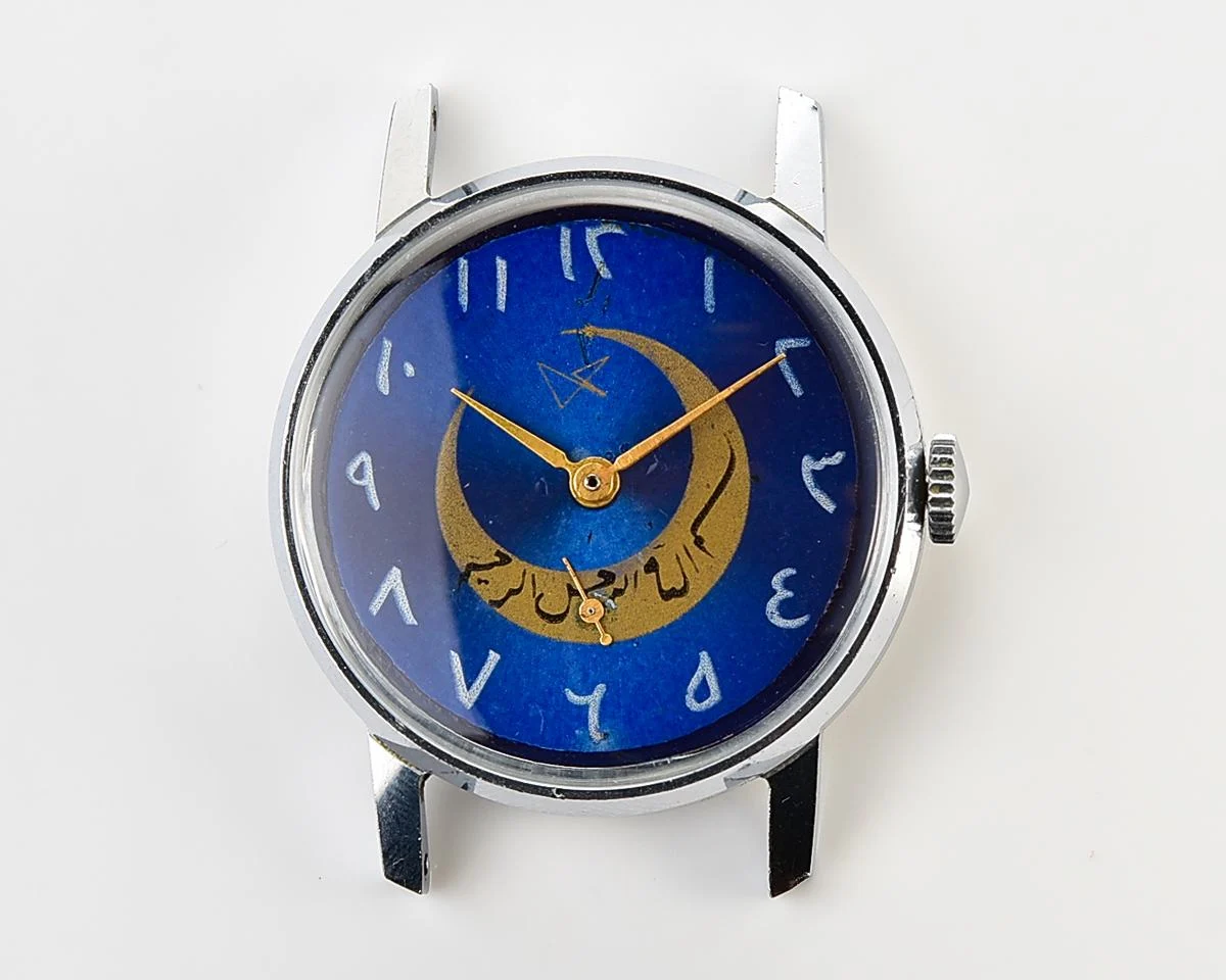 ZiM mechanical wirstwatch with Eastern Arabic numerals on the dial