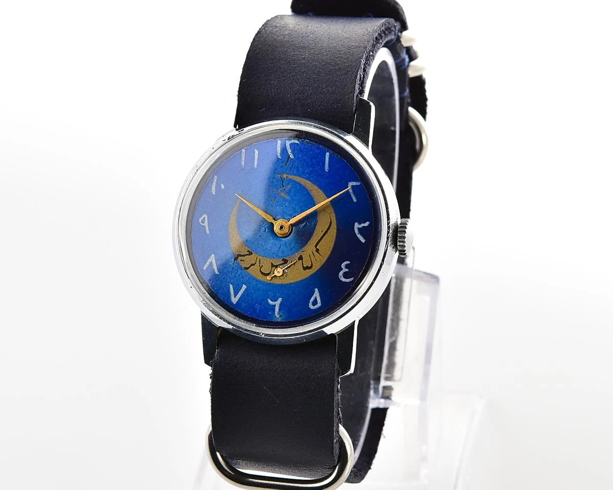ZiM mechanical wirstwatch with Eastern Arabic numerals on the dial