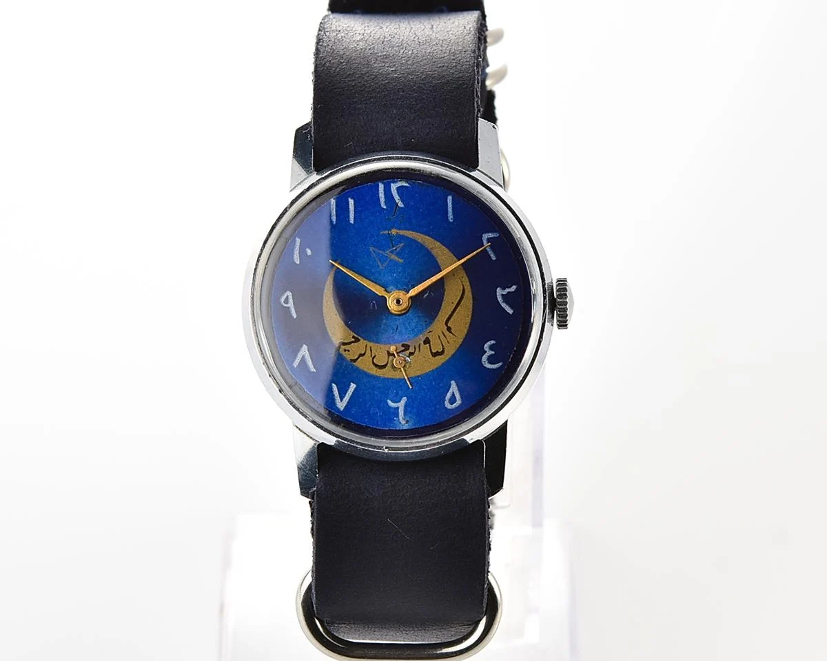 ZiM mechanical wirstwatch with Eastern Arabic numerals on the dial