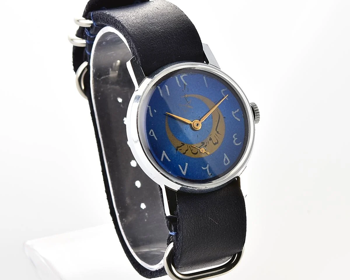 ZiM mechanical wirstwatch with Eastern Arabic numerals on the dial