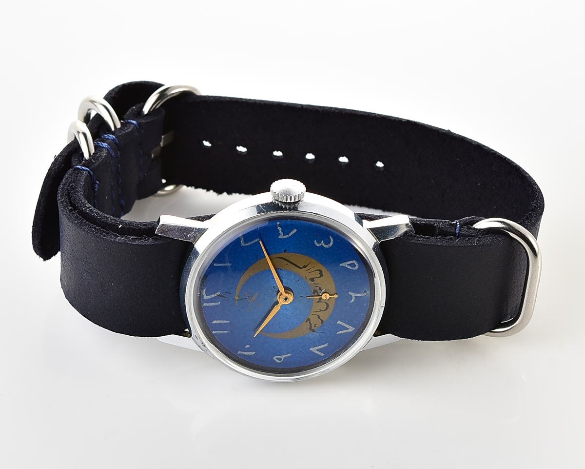 ZiM mechanical wirstwatch with Eastern Arabic numerals on the dial