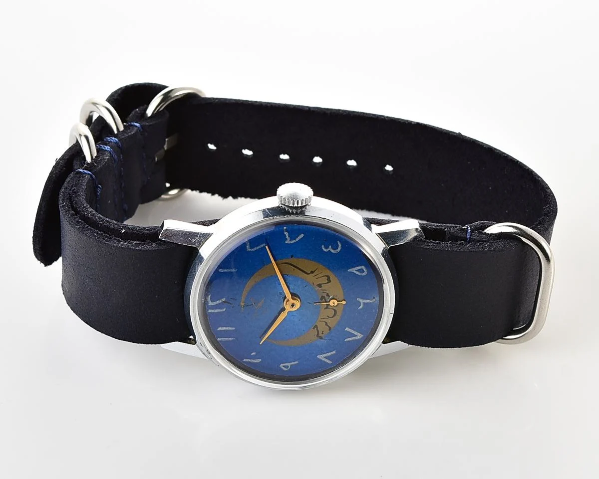 ZiM mechanical wirstwatch with Eastern Arabic numerals on the dial