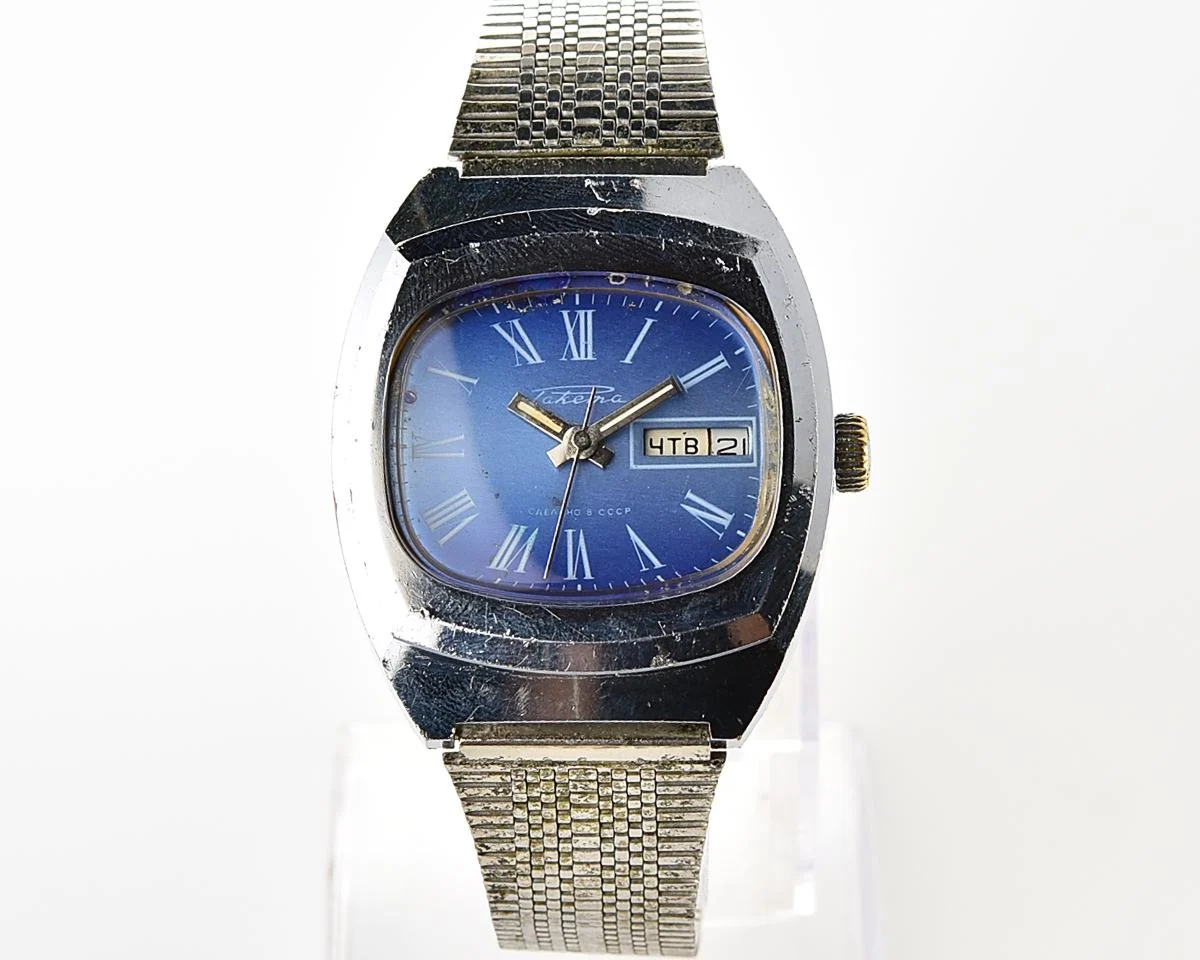 Raketa vintage Soviet mechanical wristwatch with double calendar