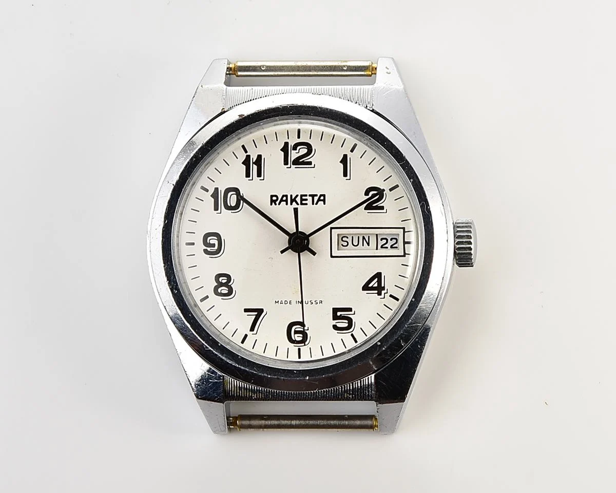 Raketa vintage mechanical wristwatch with double calendar