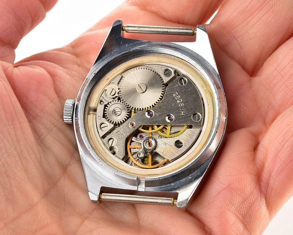 Raketa vintage mechanical wristwatch with double calendar