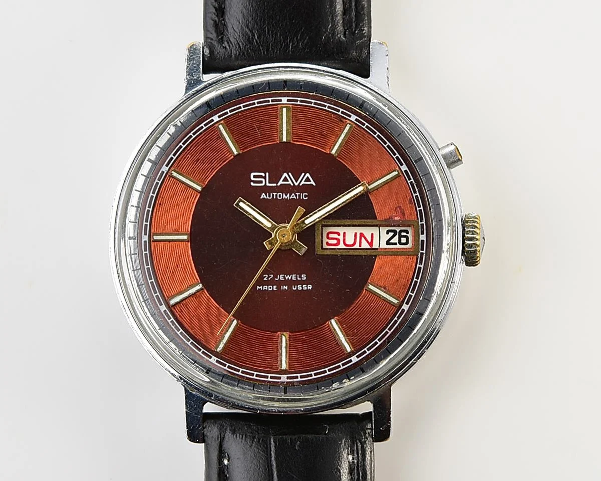 Slava Soviet mechanical self-winding vintage watch with beautiful rare "vortex" dial!