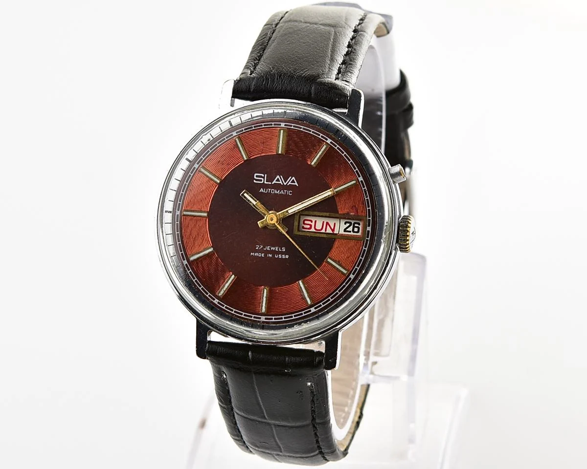 Slava Soviet mechanical self-winding vintage watch with beautiful rare "vortex" dial!