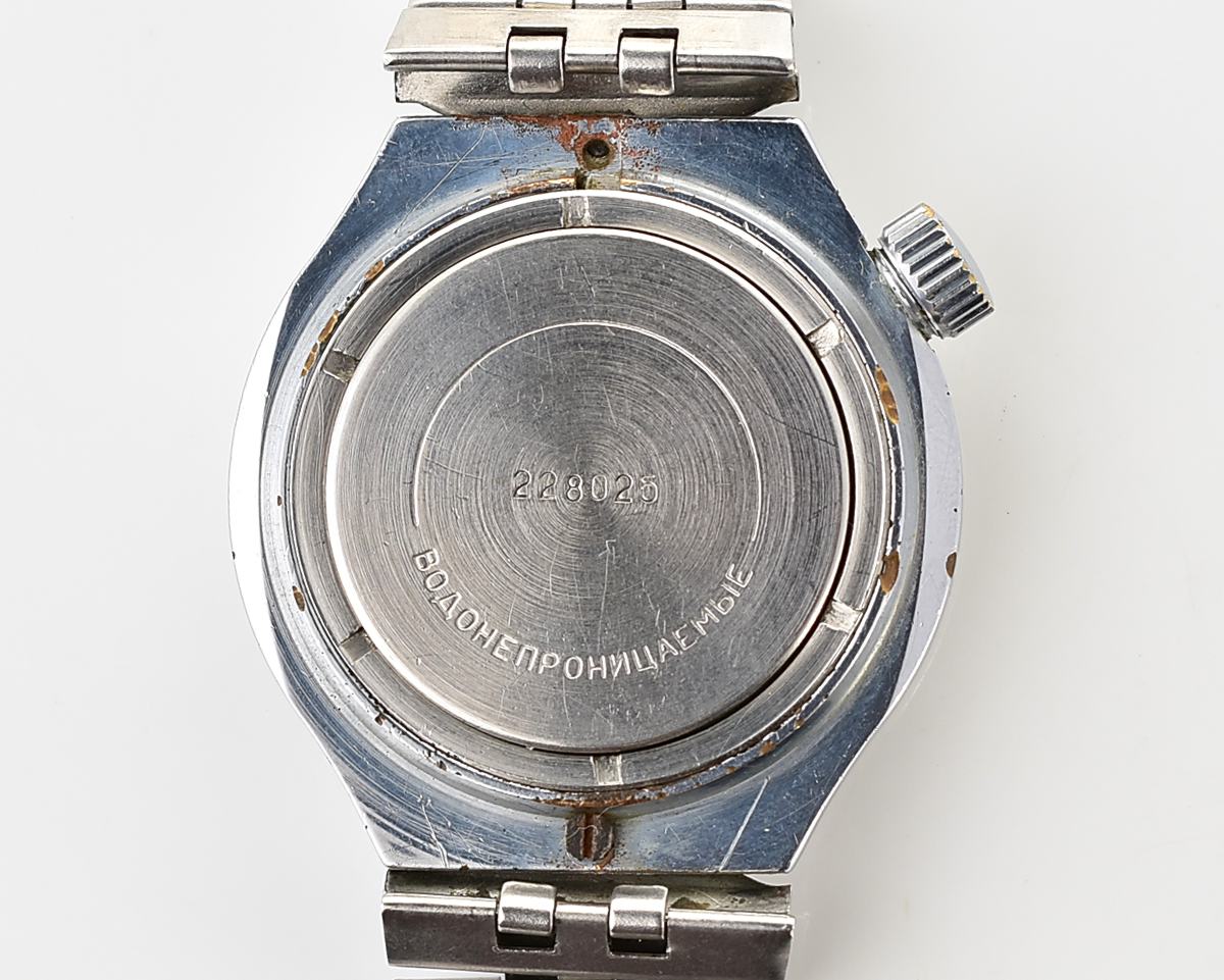 Uncommon domestic soviet mechanical Vostok with crown on 4 o'clock