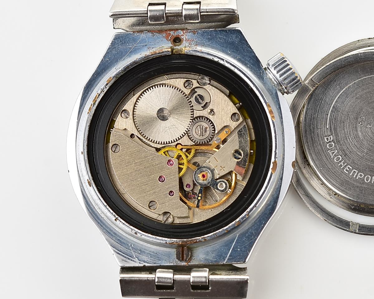 Uncommon domestic soviet mechanical Vostok with crown on 4 o'clock
