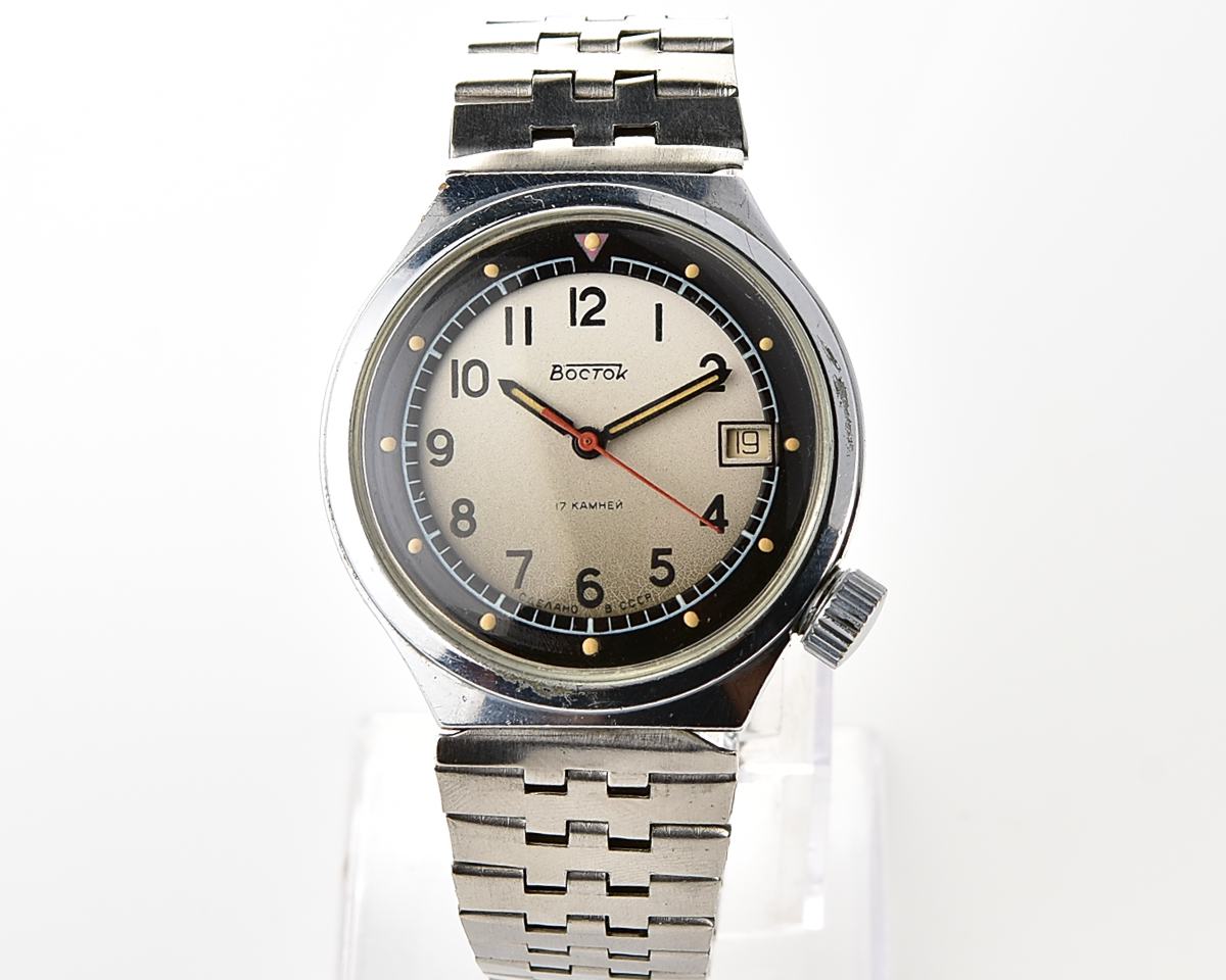 Uncommon domestic soviet mechanical Vostok with crown on 4 o'clock