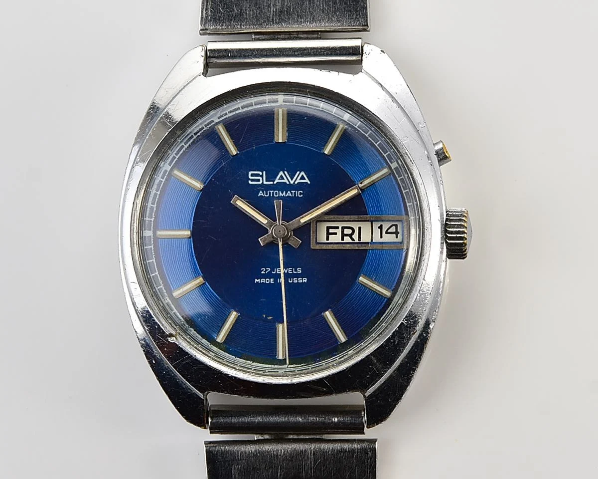 Slava Soviet mechanical self-winding vintage watch with rare "vortex" dial!
