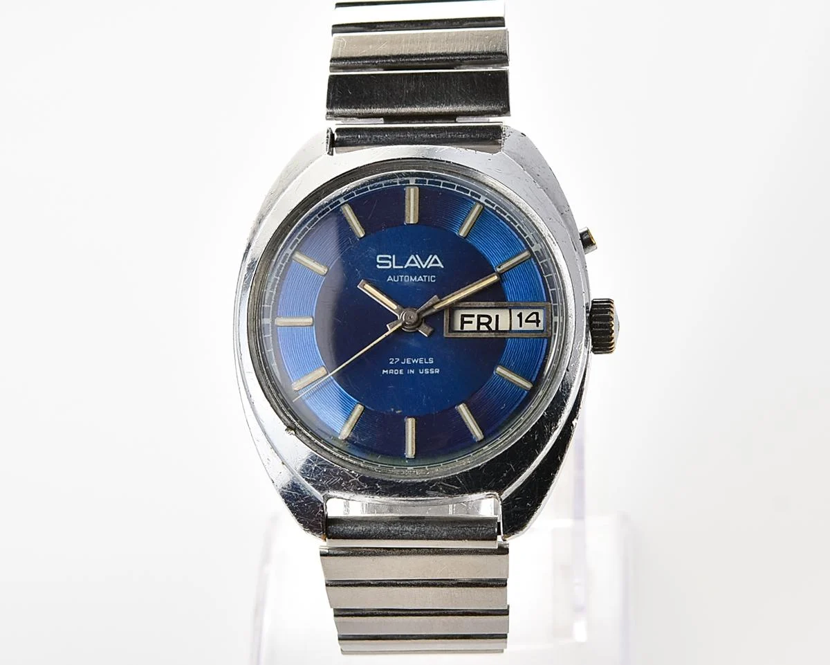 Slava Soviet mechanical self-winding vintage watch with rare "vortex" dial!