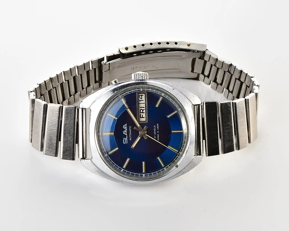 Slava Soviet mechanical self-winding vintage watch with rare "vortex" dial!