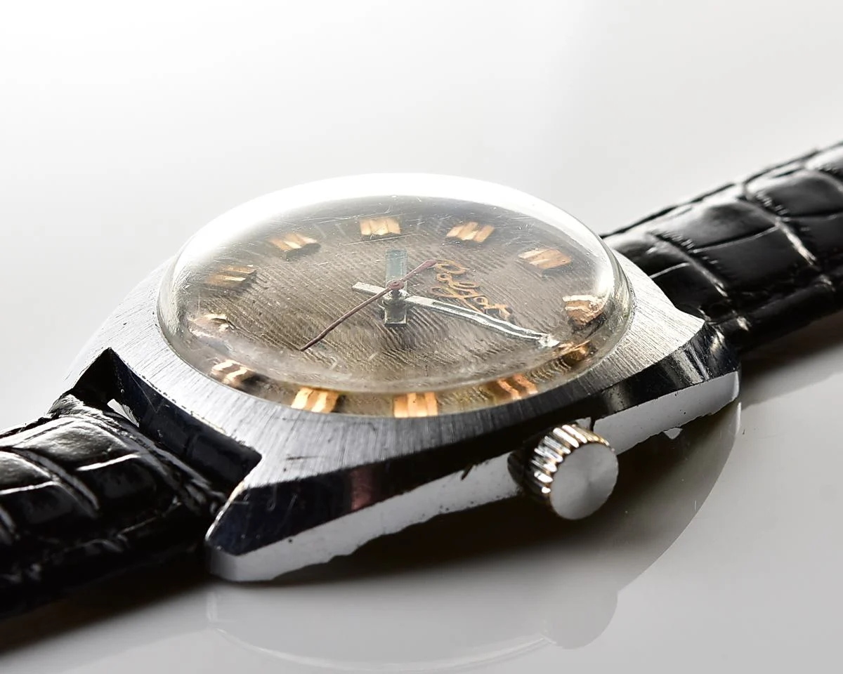 Vintage Soviet Poljot mechanical watch with intricate textured dial