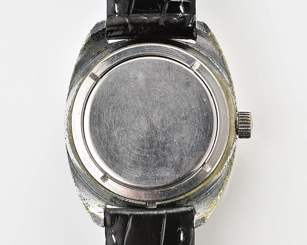 Vintage Soviet Poljot mechanical watch with intricate textured dial